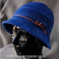 Вязание шапочки спицами.