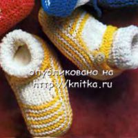 Желтые туфельки - пинетки.