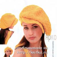 Желтая кепка, связанная спицами.